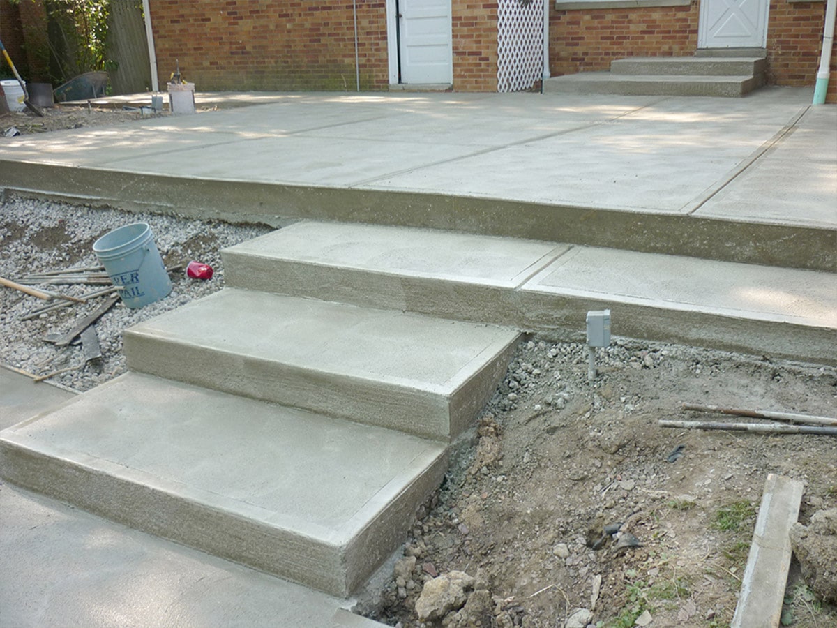 OLYMPUS DIGITAL CAMERA Newly constructed concrete patio for courtyard stairs